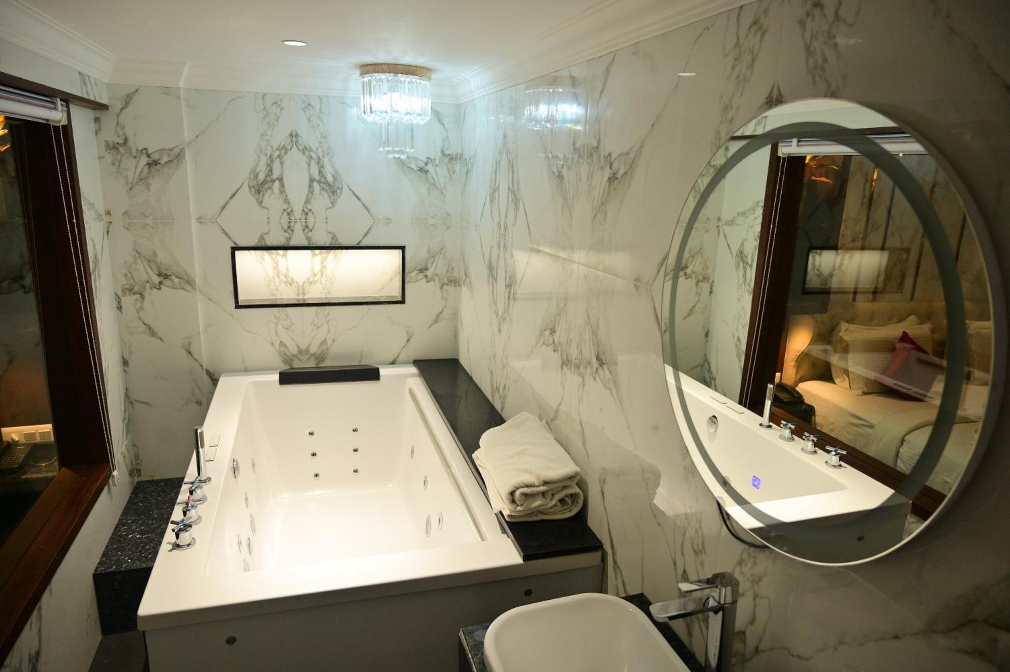 Hotel Golden Riviera Mysore Zimmer foto